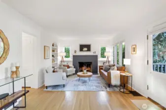 Refinished hardwoods on the main level blends with the original built-ins and lead-paned windows, all centered around the welcoming fireplace.