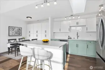 Quartz countertops and full subway tile backsplash