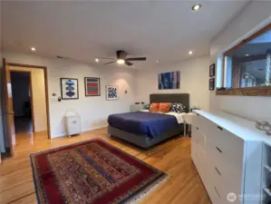 Primary has large closet, spacious bath & access to deck & patio.