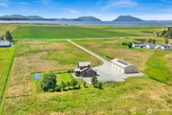 Welcome to 4913 Chuckanut Drive, Bow. 10-acres of privacy with views of the bay and surrounding farm fields