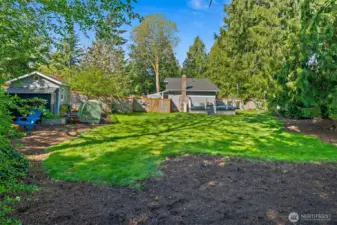 .65 Acre Lot that has been Lovingly Landscaped