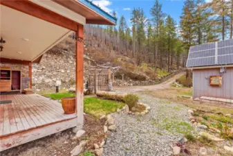 Solar shed with gas powered backup generator