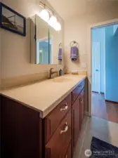 DOWNSTAIRS FULL BATH...CORIAN COUNTERS...TILE FLOORING