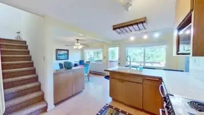 Kitchen and dining area take full advantage of the view windows.