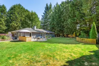 A wonderfully level lot makes this easy living not to be missed.