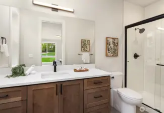 3/4 bath attached to main floor guest suite or second Primary.