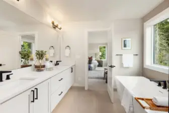 Primary bath with heated floor and motion sensor under cabinet lighting