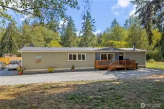 Exterior view of home from the outside with RV parking.