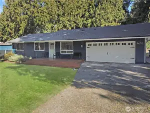 Freshly painted exterior with newer roof (approx. 5 years), brand-new front deck, and inviting curb appeal—well-maintained Bonney Lake rambler.