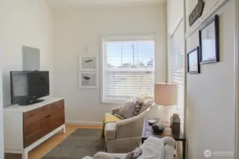 Enter the home into this charming & cozy little den and just down the hall....