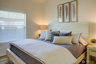 Each bedroom holds a king size bed and it cheerful and comfortable!
