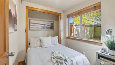 Main floor bedroom with murphy bed that folds into the closet
