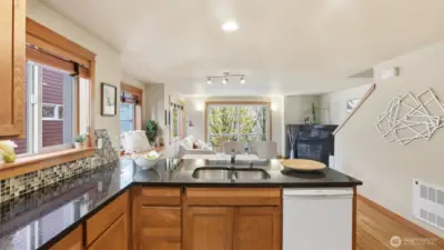 Spacious kitchen with lots of cabinet space + breakfast bar