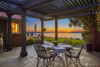 Enjoy dining al fresco under the arbor while taking in the stunning sunsets.