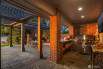 Step outside to the spacious patio—an ideal spot for summer barbecues and entertaining guests.