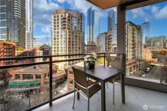 Private covered deck with a great vantage point over the Westlake corridor with the city and Lake Union view on display.