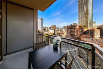 Private covered deck with a great vantage point over the Westlake corridor with the city and Lake Union view on display.