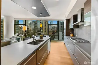 City views on display day and night while creating culinary delights.