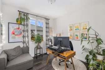 Versatile home office with window for natural light, space for a full desk setup, and room for plants or creative décor, making it ideal for remote work, hobbies, or a quiet study area.