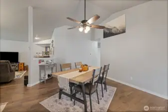 Living room leads to the eat-in kitchen