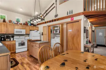 Dining room, kitchen, and laundry area