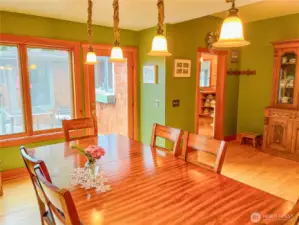 Entry from gourmet kitchen to formal dining room. Access to patio as well