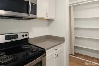 Large storage/pantry area outside of kitchen