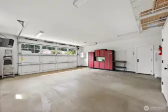 Oversized Garage. Heated. Work Space Stays With Property.