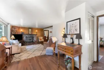 Laminate Hardwood flooring throughout the shared spaces of main home.