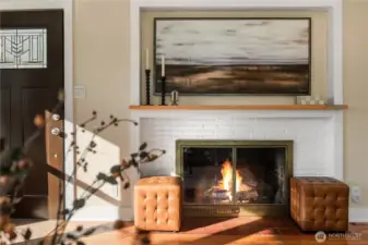 This masonry fireplace is one of two in the house. This one has a gas line plumbed in ready for an insert if desired.