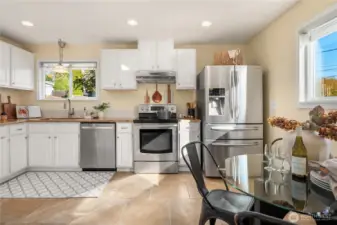 This shot shows off how large this room is with plenty of dining space.