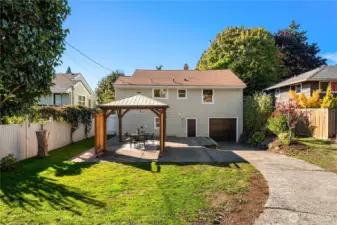 The attached garage is extra deep and has a secondary work shop area perfect for storage and tools.
