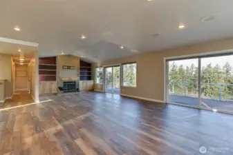 Check out the pull down stairs for the carpeted and lighted attic in the hallway.