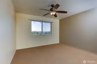 Spare bedroom also with a view of the mountain and water