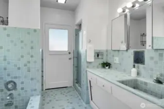 How cool is this original Primary Bath? That is definitely some mid-century tile! (door leads out to the patio).