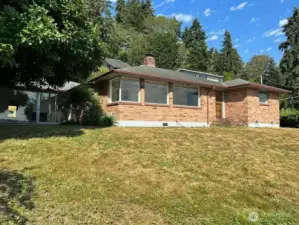 The home sits up high on a hill which allows for panoramic views of the lake and mountains.