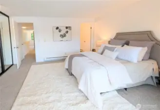 Generous primary suite with natural light