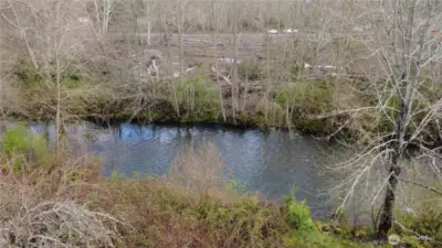 Riverfront on Big Quilcene River. Watch the eagles soar, and the salmon run up stream