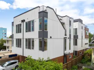 Live the coveted Green Lake lifestyle in this fantastic 4-star Built Green townhome