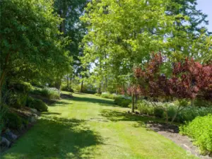 Mature gardens along the waterfront.