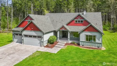 Three (plus) car garage providing even more parking / storage space. Plus concreted parking pad. Well-manicured, low maintenance landscaping. Pathway leads to the covered front entry.