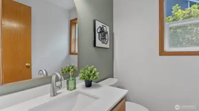 Convenient and lovely downstairs half bathroom.