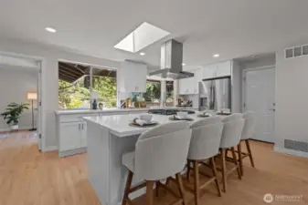 Spacious kitchen washed by natural light.