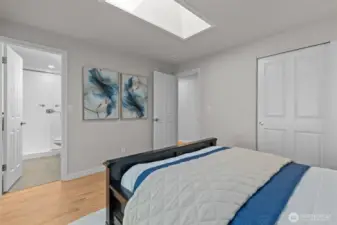 Bath with double-headed shower off your primary bedroom.