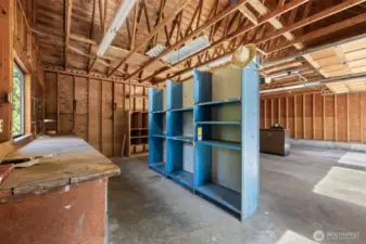 Shop with plenty of work space. Complete with compressor and 240V power.