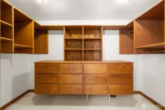 Oversized Primary Closet, with natural wood build ins.