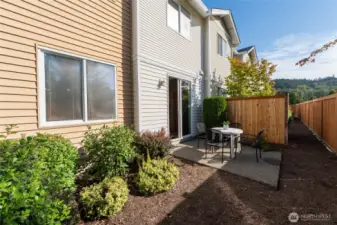FENCED back patio perfect for your pup.