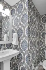 Stylish powder room on main level.