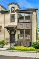 One of the coveted end units means 8 extra windows that the inside units dont have.