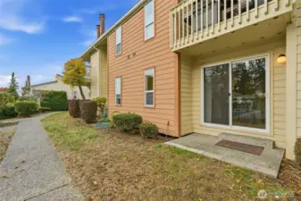 The rear patio has an additional storage area as well as the storage area in the carport.